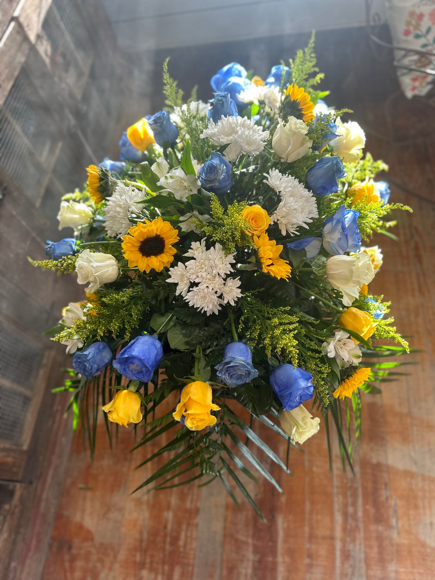 Blue and Gold Sympathy Casket Spray