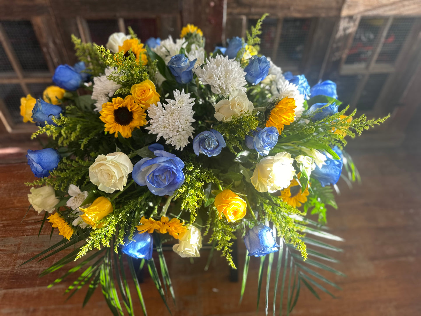 Blue and Gold Sympathy Casket Spray